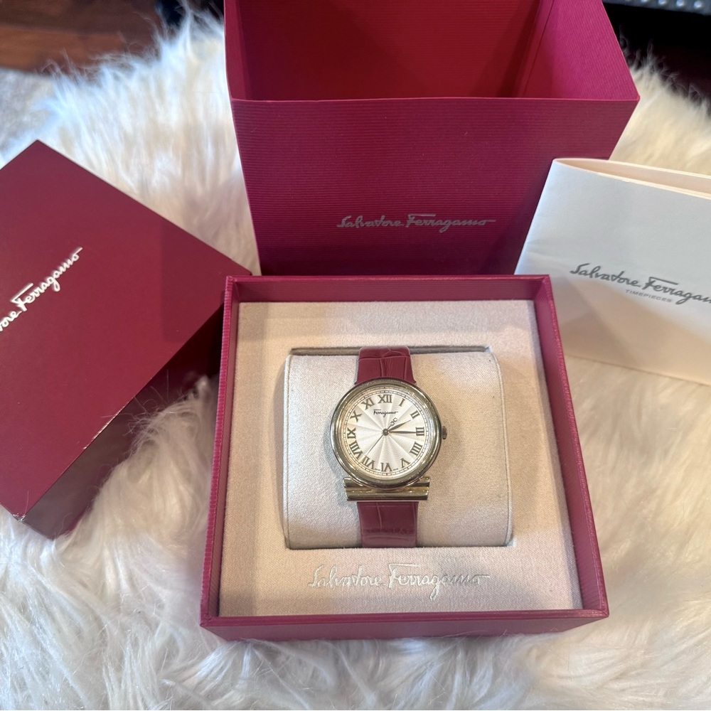Gancini Timeless Collection in brown leather by Salvatore Ferragamo